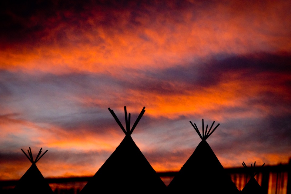 Teepees at sunset
